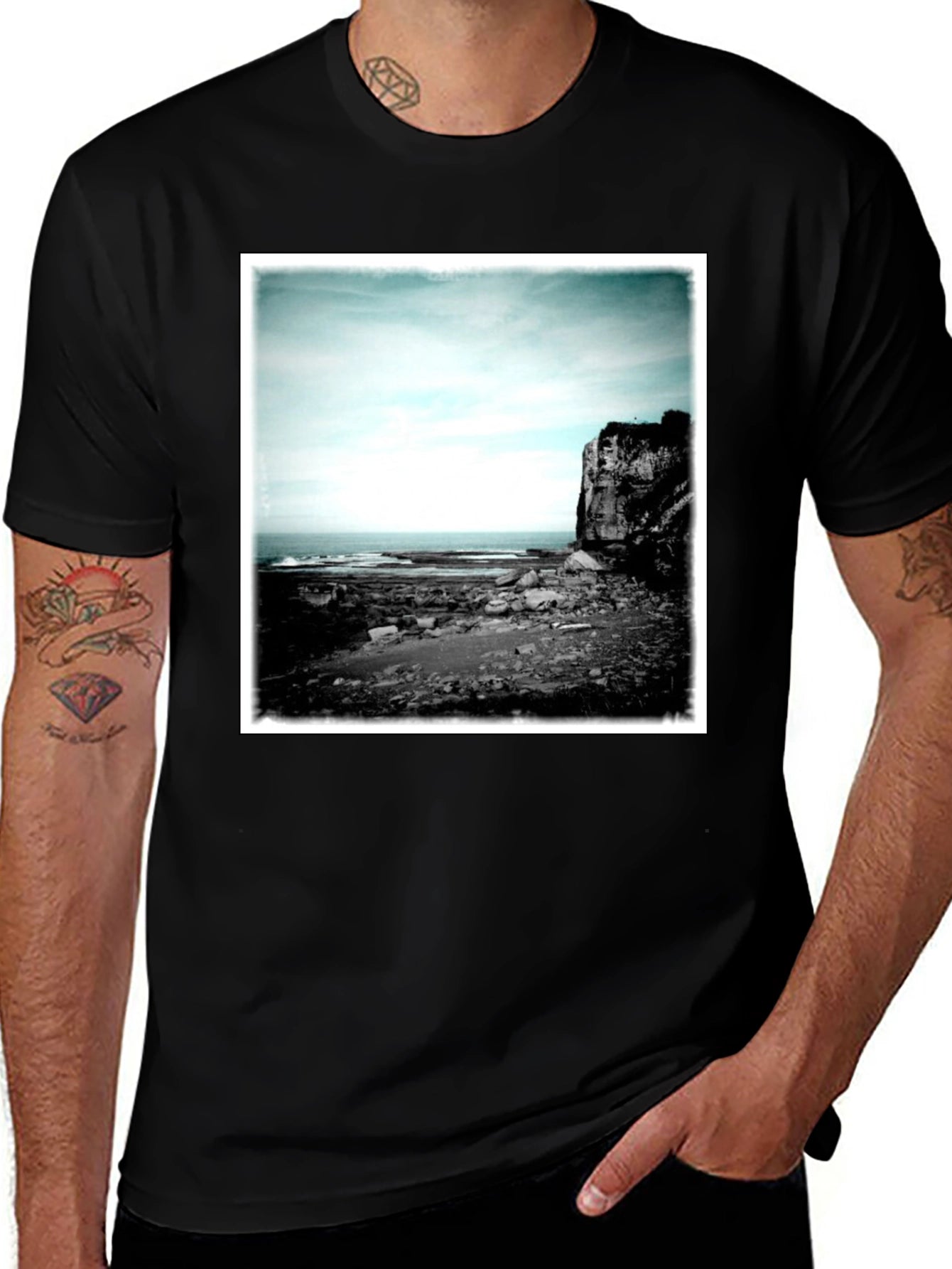 Black Tee with Coastal Landscape Graphic